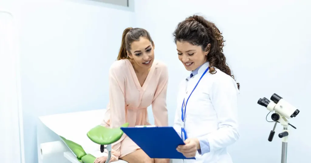Doctor explaining Colonoscopy procedure to a patient.