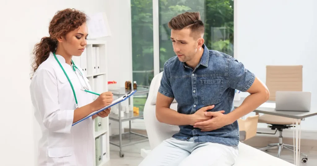 Gastroenterologist consulting a patient about persistent acid reflux and potential Gastroesophageal Reflux Disease (GERD) diagnosis