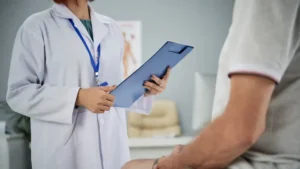 GI specialist consulting patient for ulcer treatment in Chicago